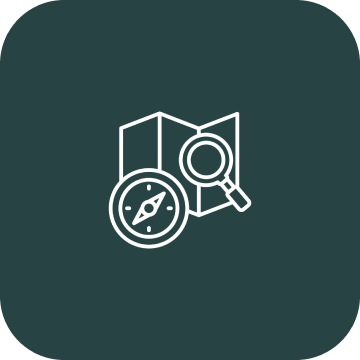 Map with compass and magnifying glass icon.