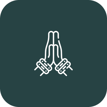 Praying hands icon on dark background.